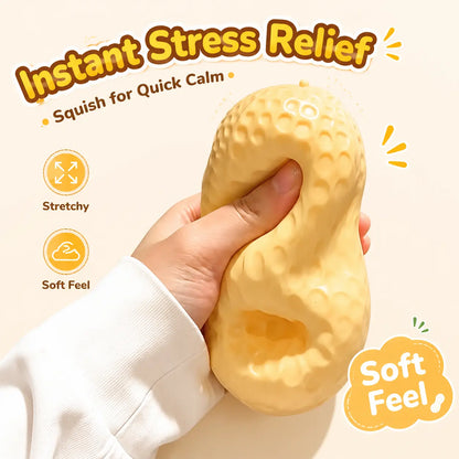 Peanut-shaped calming toy compressed by hand for a gentle pressure experience, offering a comforting activity for relaxing during busy everyday moments.