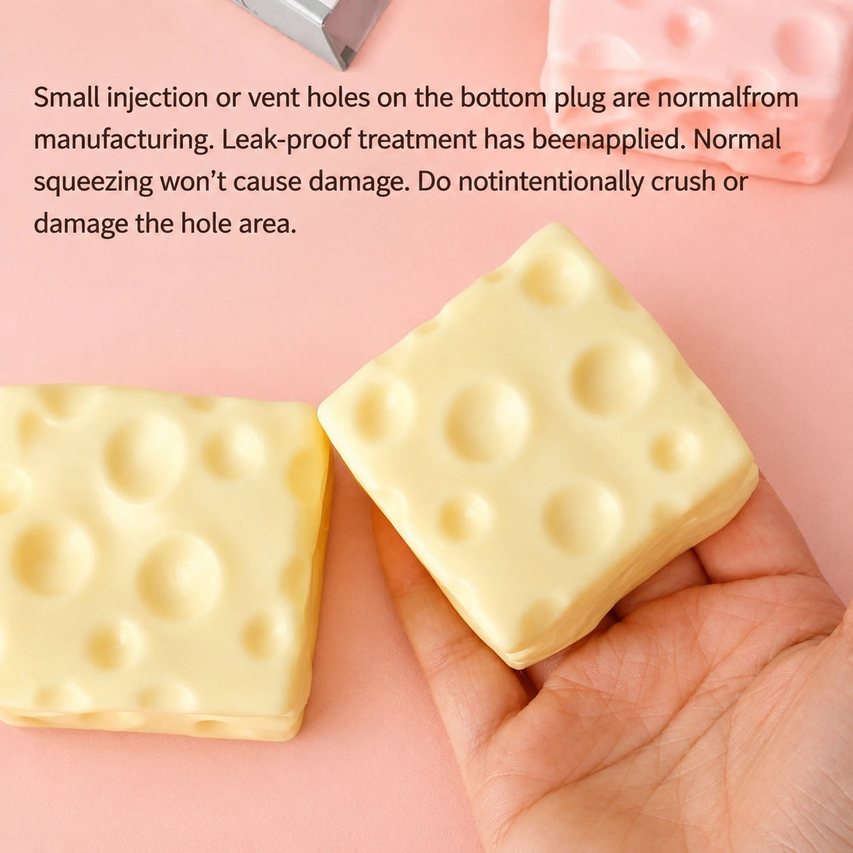 Soft cheese squishy toy held in hand with flexible squeeze texture