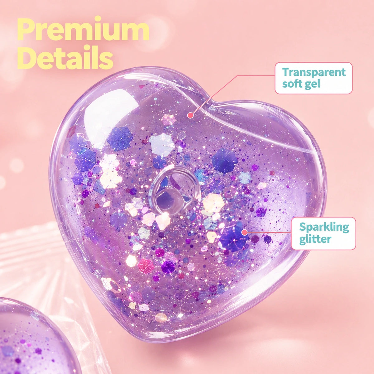 Transparent soft gel heart squishy filled with sparkling glitter, a satisfying sensory squeeze and fidget toy for stress relief and relaxation.