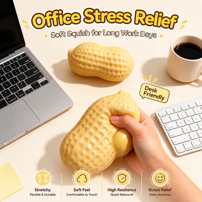 Peanut-shaped workspace companion used beside a laptop and keyboard during a work break, offering a simple hands-on activity for busy office days.